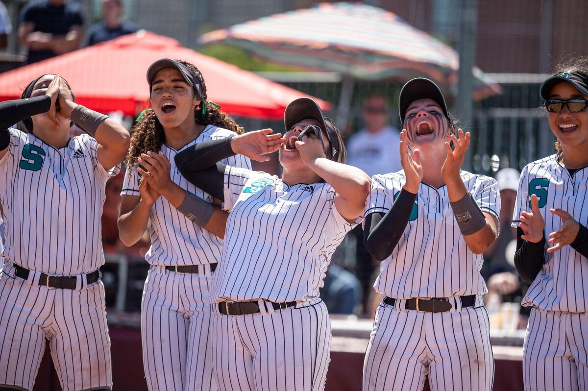 Sheldon players, from left, catcher Jaylee Marshall, Imani Black, pitcher Breanna Romero, Beija Allen and Sakora Harvell celebrate teammates while collecting their patches and hats after their 7-1 Sac-Joaquin Section Division I high school softball championship win over Lincoln of Stockton on Saturday at Sacramento City College.