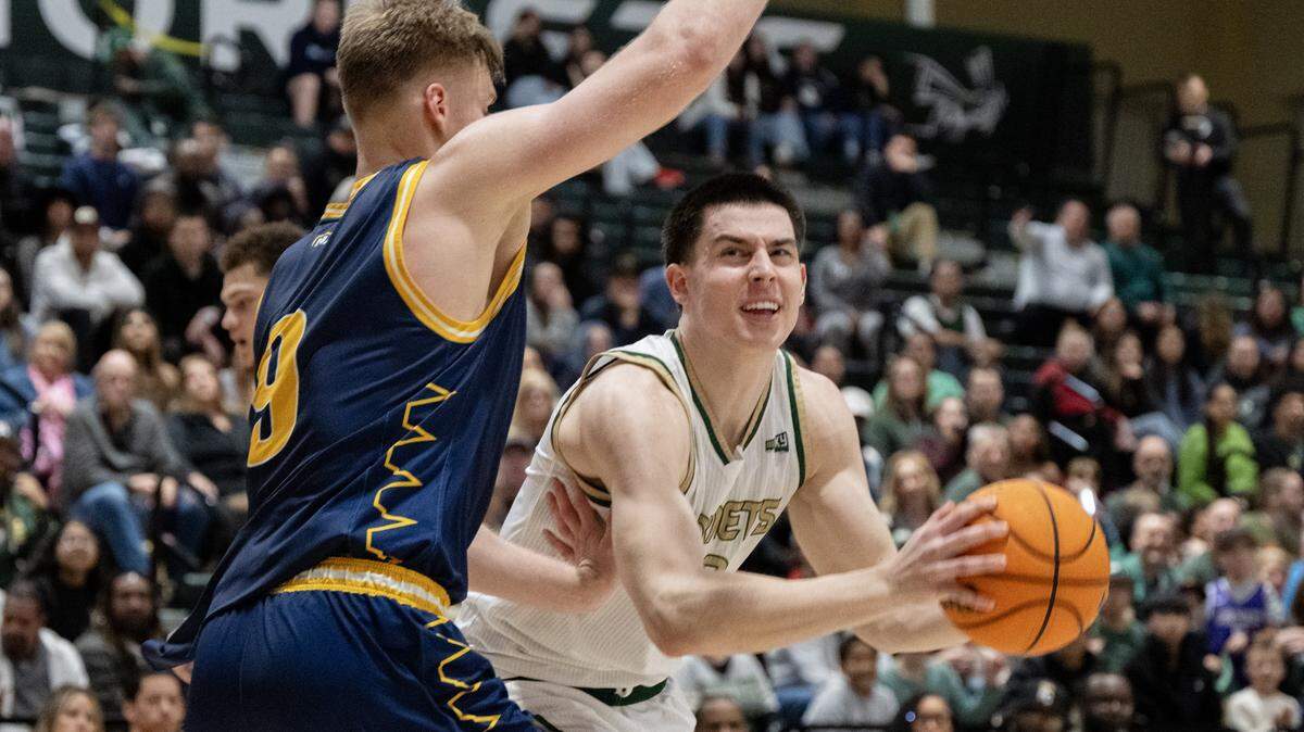 Sacramento State Hornets forward Mark Lavrenov makes a move to the basket as Northern Arizona Lumberjacks forward Karl Poom defends in the second half of a game on Thursday, Jan. 15, in Sacramento.