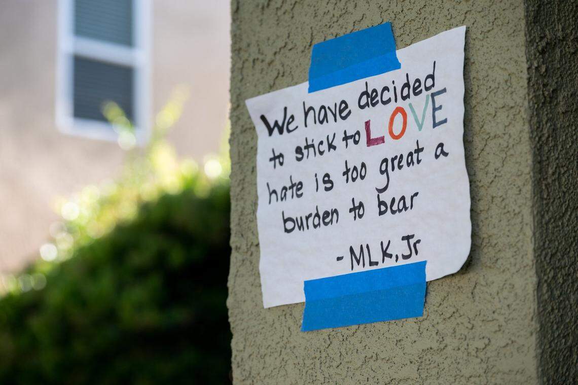 Johanna Martinezmoles has a sign posted outside her home with a Martin Luther King Jr. quote on June 20 in Antelope. Her LGBTQ+ Pride flags have been taken three times in the past year.