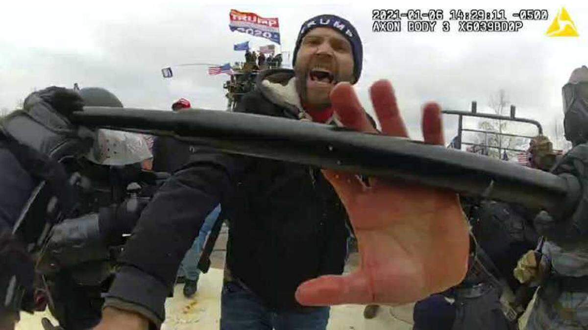 Bodycam footage shows a man who is believed by the FBI to be Granite Bay resident Dane Thompson lunging at a police officer.