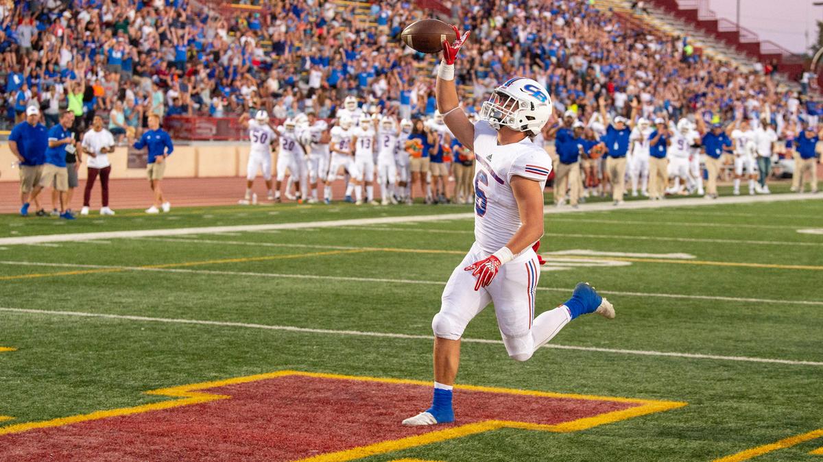 Christian Brothers’ Justin Douglas (6), runs for a touchdown making the score 7-0 as the Jesuit Marauders face the Christian Brothers Falcons in the Holy Bowl at Hughes Stadium at Sacramento City College on Saturday, Sept. 14, 2019.