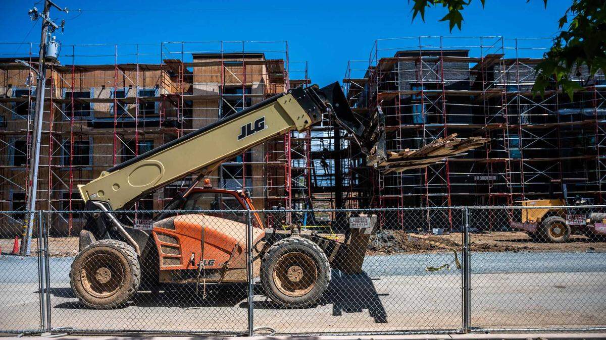 A construction vehicle passes by the Mercy affordable housing development in Auburn on Wednesday, April 14, 2021. In 2026, affordable housing projects will give priority to Placer County workers and residents after July 1.