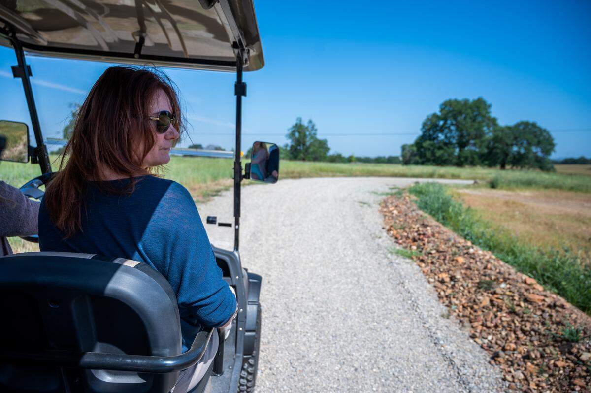 Jill Seoane, 52, of Meadow Vista, takes a tour of Morgan Oaks Eternal Preserve in Lincoln on Earth Day.
