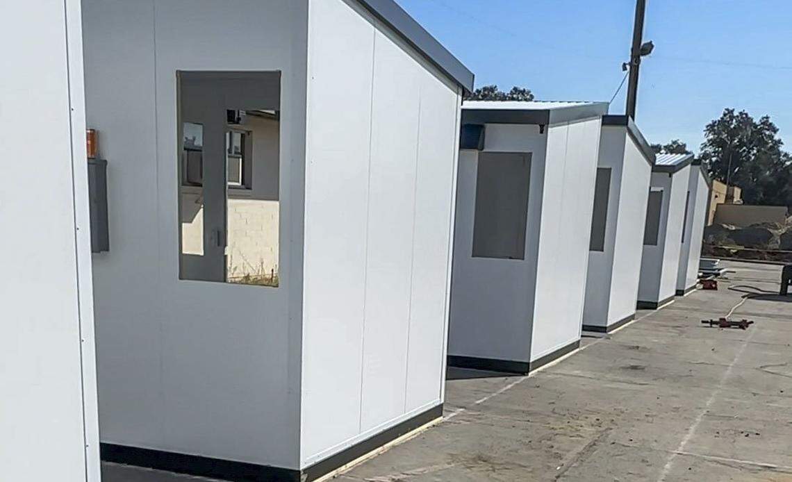 Some of the 135 tiny homes under construction at the city of Sacramento’s Roseville Road Shelter-and-Service Campus on Thursday.