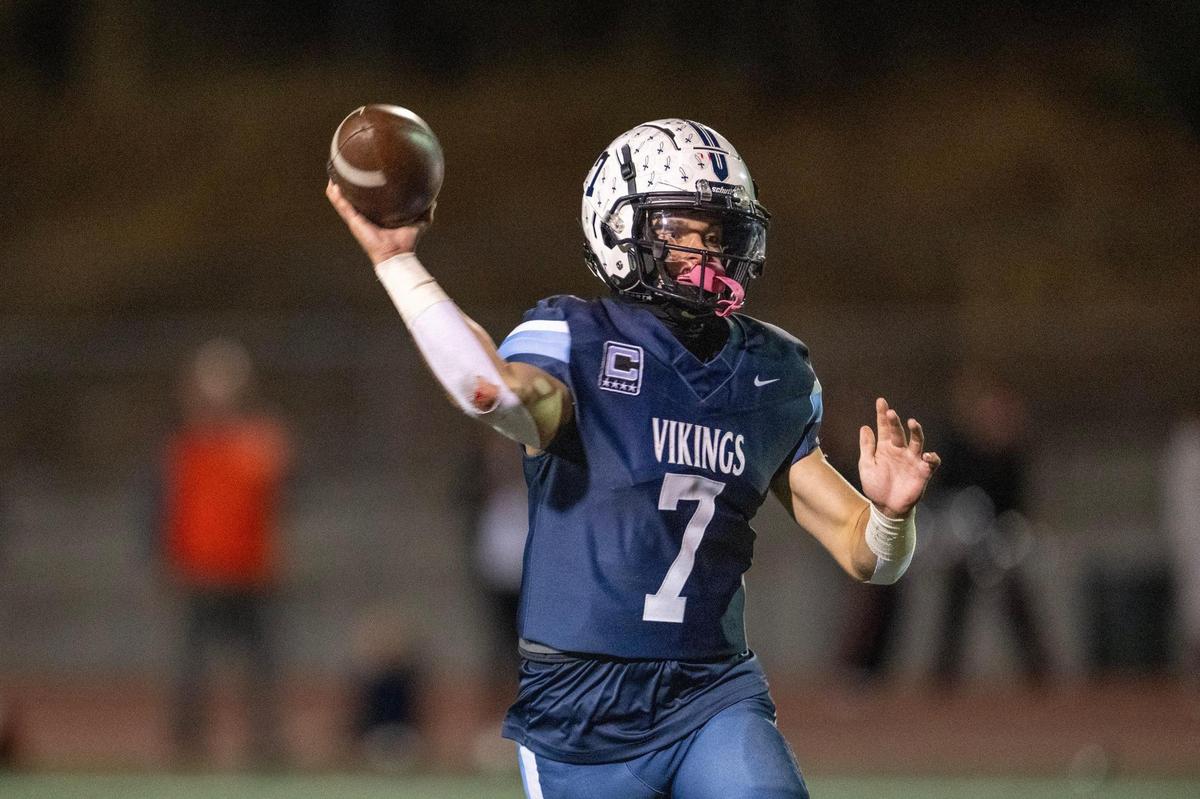 Oakmont Vikings quarterback Beau Ogles (7) throws a pass in the first half against the Marysville Indians on Friday, Oct. 25, 2024, in Roseville.
