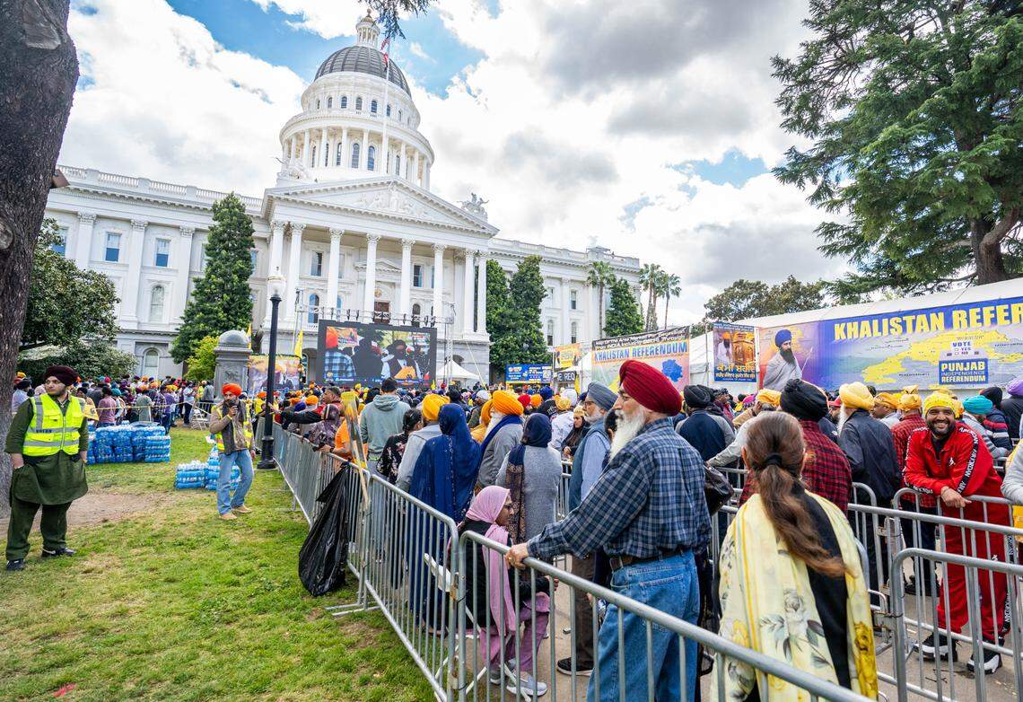 Sikhs wait in line at the state Capitol to vote in an unofficial Khalistan referendum on Sunday.