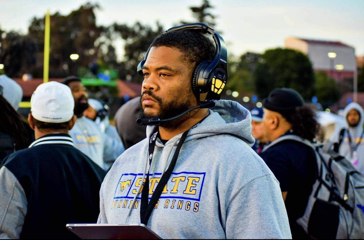 Josiah Johnson, seen coaching with the Grant Pacers in 2026, is the new head football coach at Sacramento High School, his alma mater.