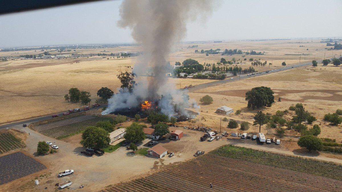 A “Victorian-esque” structure burns on Jackson Road, as seen from a Sacramento Metro FIre Department helicopter.