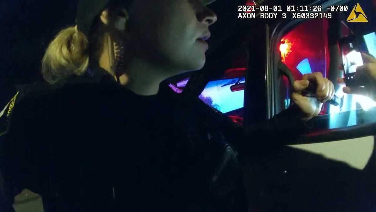 In an image taken from sheriff’s body-worn video in the minutes after his arrest, Larry Weigle is seen being photographed by deputies and is heard asking, “Which one of you all kicked me in my face when I was down?” Later, while in the back of a patrol vehicle, Weigle repeatedly asked which deputies kicked him, if deputies had their body cameras on and said he wanted to file a report about being kicked.