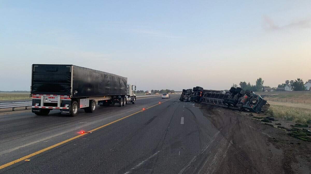 Both lanes of Interstate 5 are closed near Elk Grove Boulevard after a big rig overturned early Friday, April 23, 2021. Traffic was flowing very slowly using the center median.