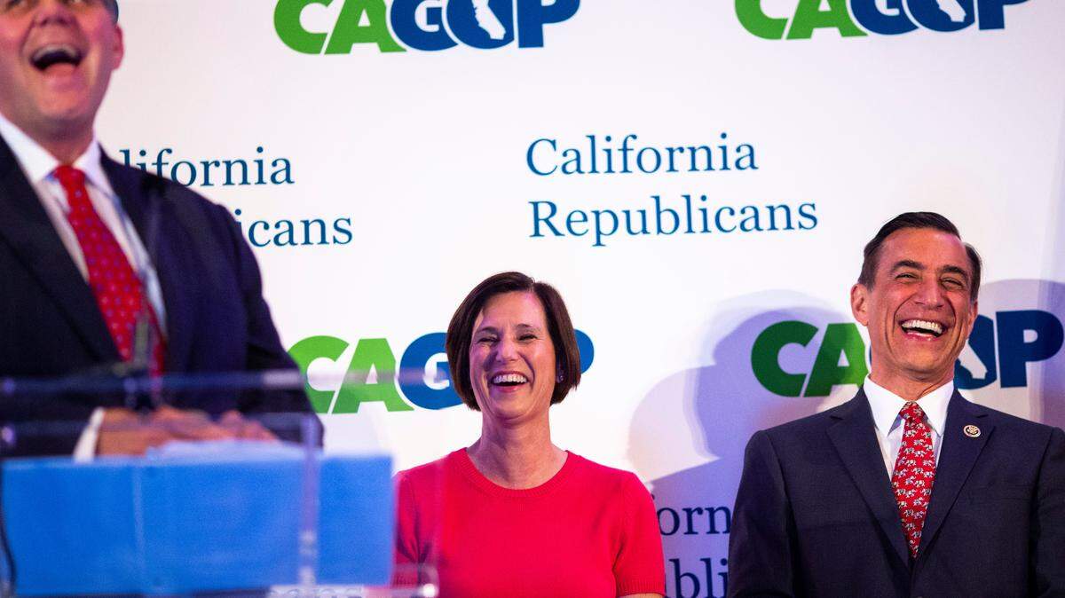 Republican Reps. Mimi Walters, center, and Darrell Issa, right, listen to state GOP Chairman Jim Brulte at the party convention in San Diego in May.
