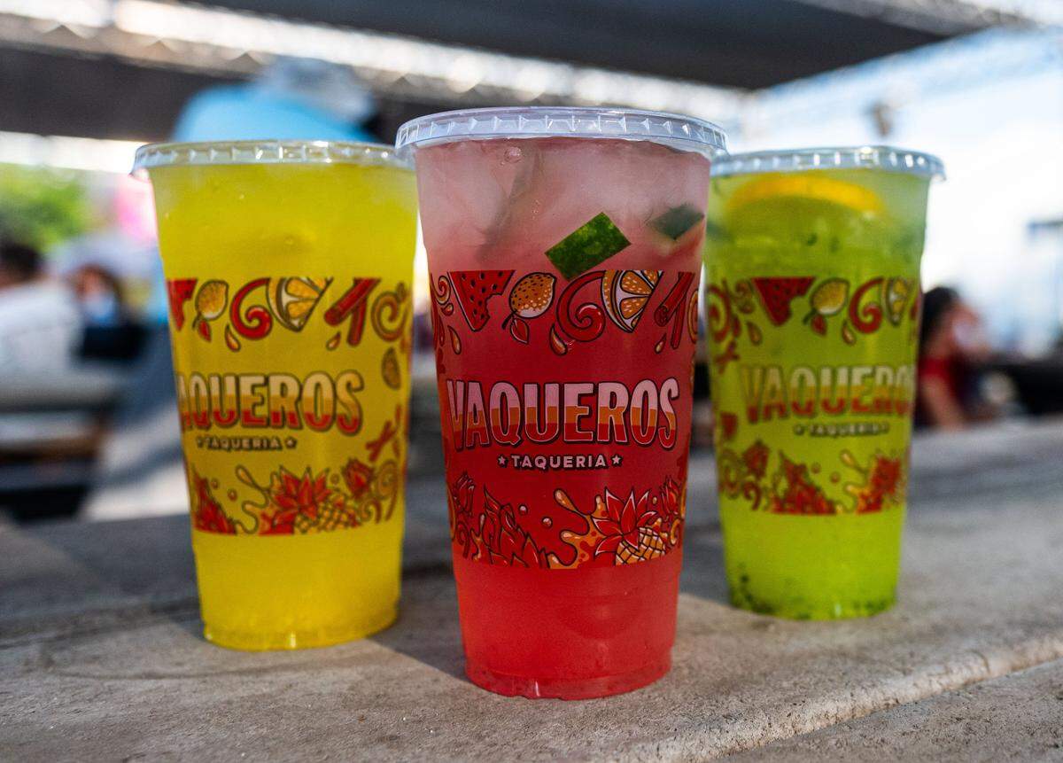The aguas frescas from Vaqueros Taqueria come in a variety of flavors, including pineapple, left, watermelon, center, and cucumber at the California State Fair on July 11, 2025.