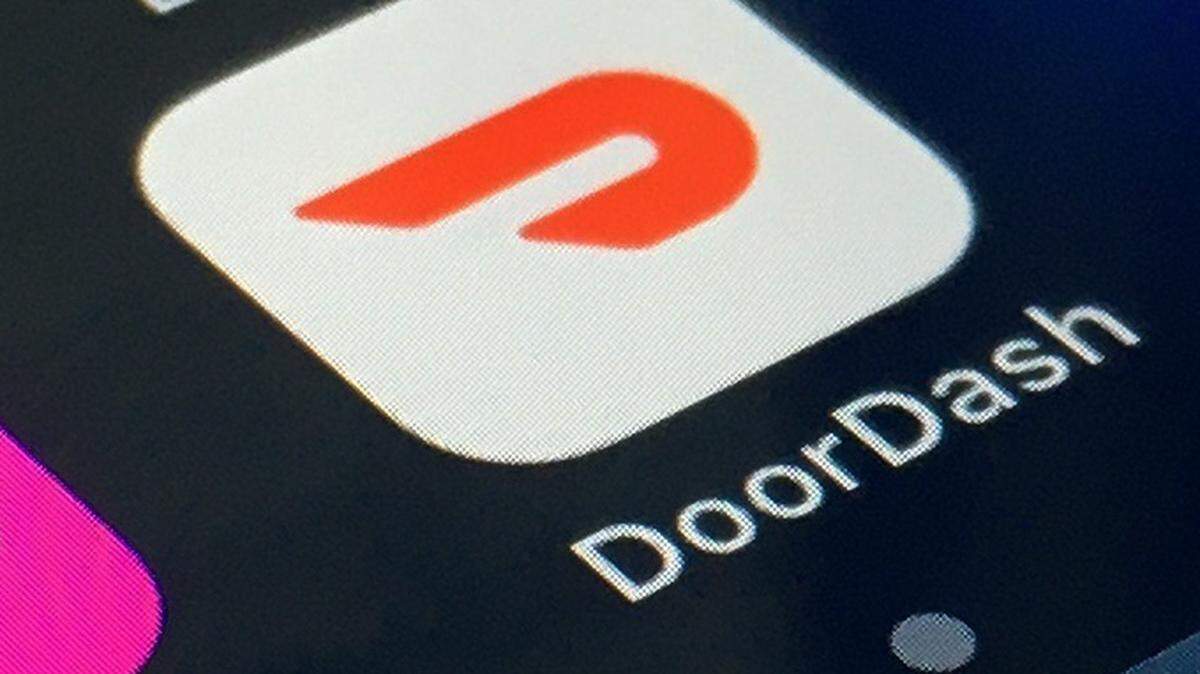 FILE - In this Feb. 27, 2020, file photo, the DoorDash app is shown on a smartphone in New York. Some Modesto City Schools students have ordered food at school through DoorDash and other delivery services..
