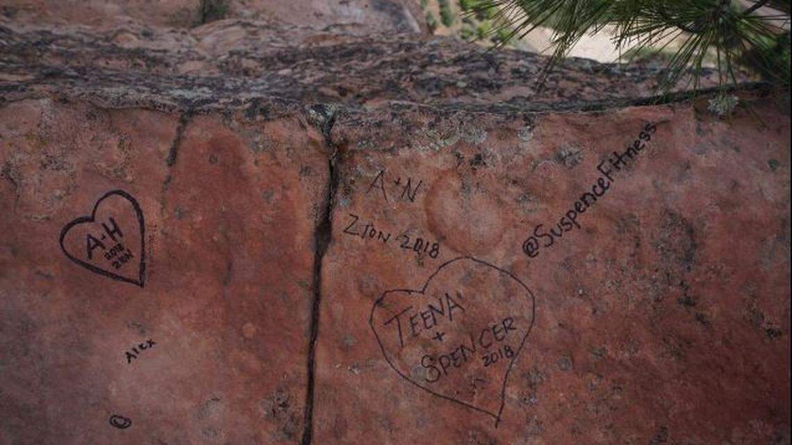 Photographer Joe Braun’s shot of graffiti at Angels Landing in Zion National Park in Utah went viral on social media, leading the self-confessed vandal to turn himself in to park rangers after a “swift and severe” backlash.