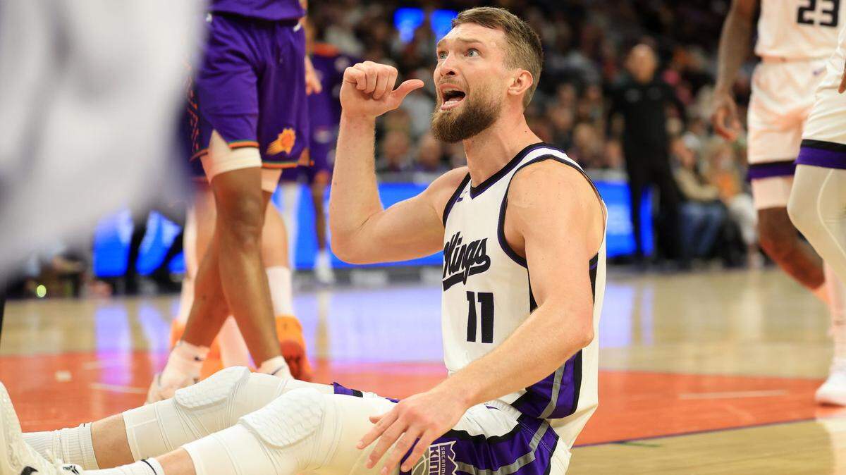 Mar 14, 2025; Phoenix, Arizona, USA; Sacramento Kings forward Domantas Sabonis (11) reacts against the Phoenix Suns during the second half at Footprint Center. Mandatory Credit: Mark J. Rebilas-Imagn Images