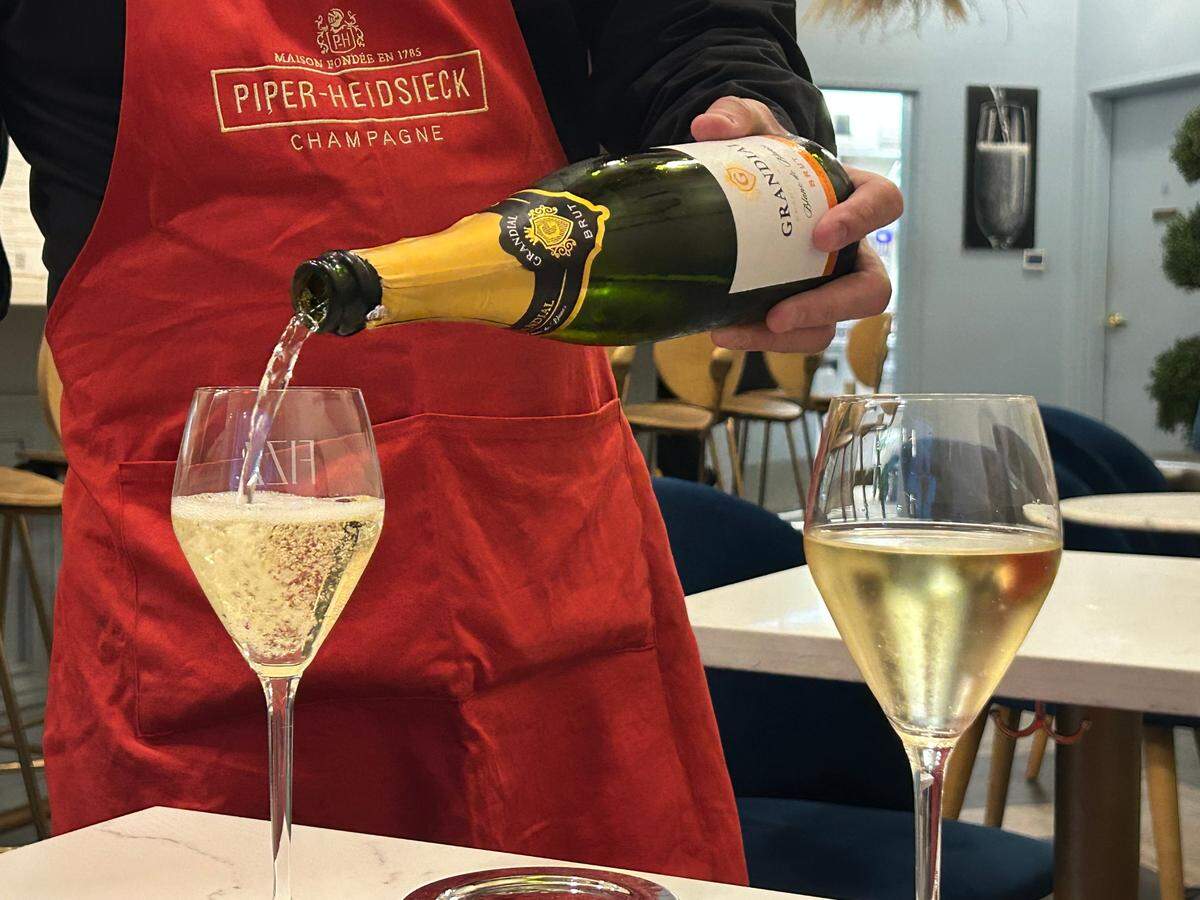  A glass of French Sparkling Blanc de Blanc of the happy hour menu for $10 at Fizz Champagne and Bubbles Bar.