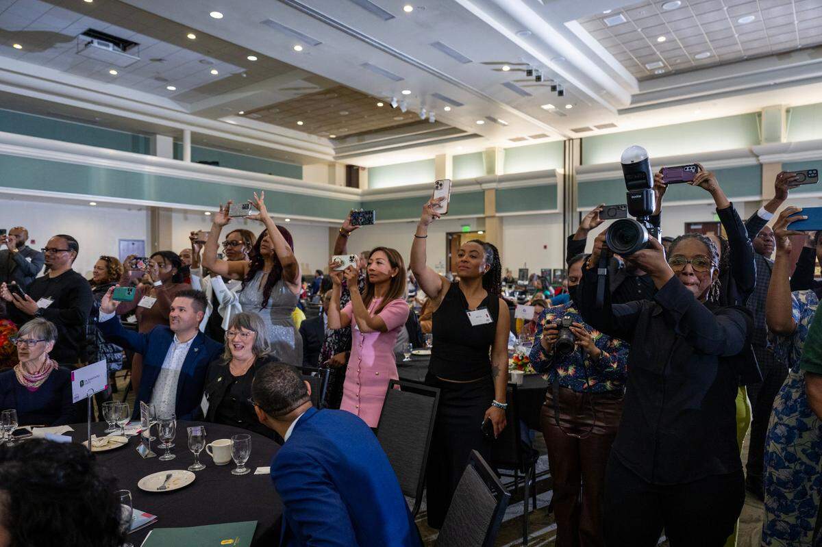 Well-wishers capture images during the Change Makers Celebration 2025 on Friday at Sacramento State.