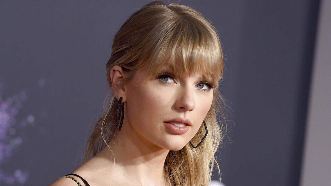 FILE - This Nov. 24, 2019 file photo shows Taylor Swift at the American Music Awards in Los Angeles. Swift was named songwriter of the year at the second annual Apple Music Awards. (Photo by Jordan Strauss/Invision/AP, File)