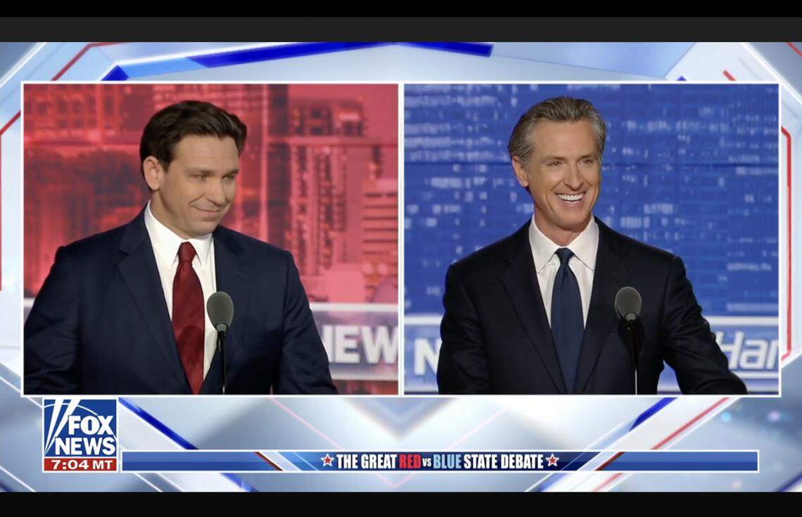 Florida Gov. Ron DeSantis, a Republican, debates California Gov. Gavin Newsom, a Democrat, in a Fox News debatę moderated by Sean Hannity on Thursday, Nov. 30, 2023.