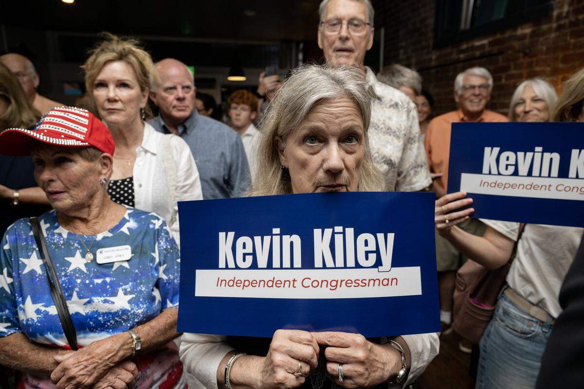 Supporters listen to independent congressional candidate Kevin Kiley at Fourscore Coffee in Roseville on primary election night, Tuesday, June 2, 2026.