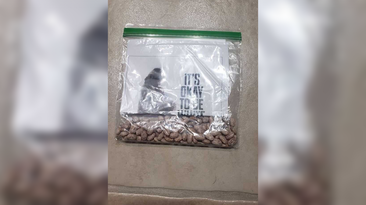 Flyers that said, “It’s okay to be white,” and provided a link to a white supremacist organization were folded in half and placed in a plastic bag that contained pinto beans on the sidewalks and driveways of Callander Way on Friday, Jan. 27, 2023. A resident said that the four flyers they saw were on driveways of houses occupied by persons of color.