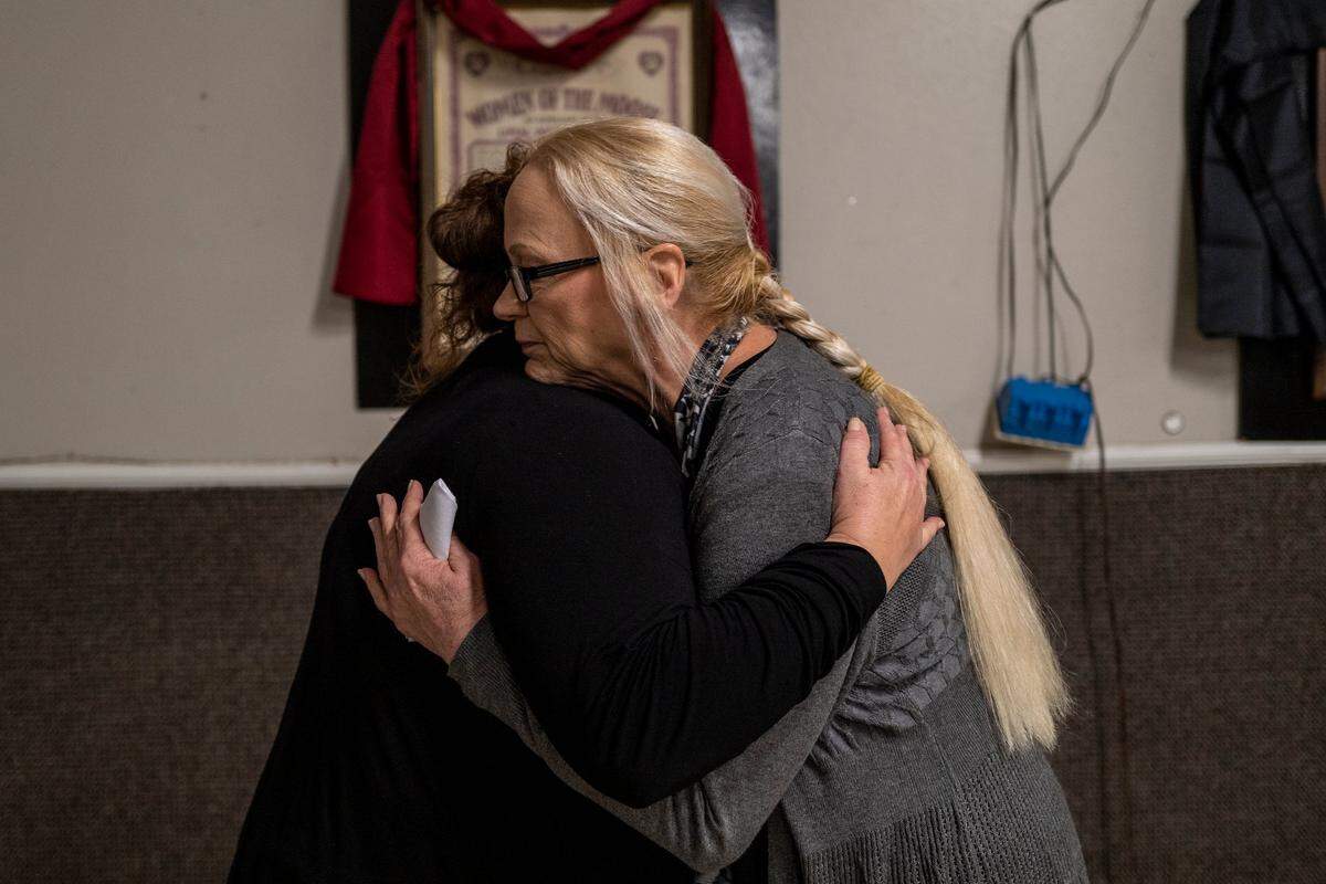Linda Rippee Privatte, right, is comforted at the memorial for her brother, James Mark Rippee, in Vacaville on Friday. He was a blind, mentally ill homeless man who she and her family tried to get help for over the past 16 years since a motorcycle accident, at the age of 24, caused a severe head injury.