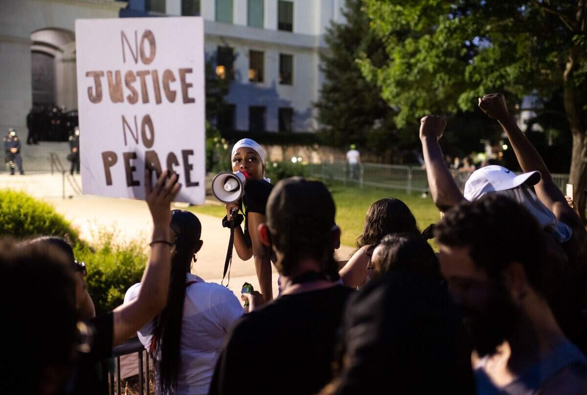 Jaeda Montgomery, of Sacramento, refocuses protesters Wednesday, June 3, 2020, outside the State Capitol in Sacramento. George Floyd was killed by Minneapolis police on Memorial Day, sparking civil unrest across the country. The California National Guard was deployed Monday, along with an 8 p.m. curfew in response to property destruction and looting.