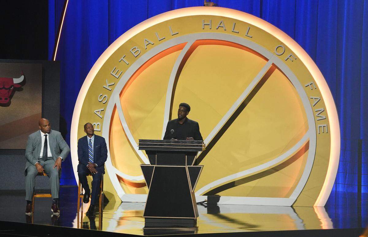 Class of 2021 inductee Chris Webber speaks alongside presenters Charles Barkley and&nbsp;Isiah Thomas during the Naismith Memorial Basketball Hall of Fame Enshrinement on Sept. 11, 20021, at MassMutual Center in Springfield, Massachusetts.
