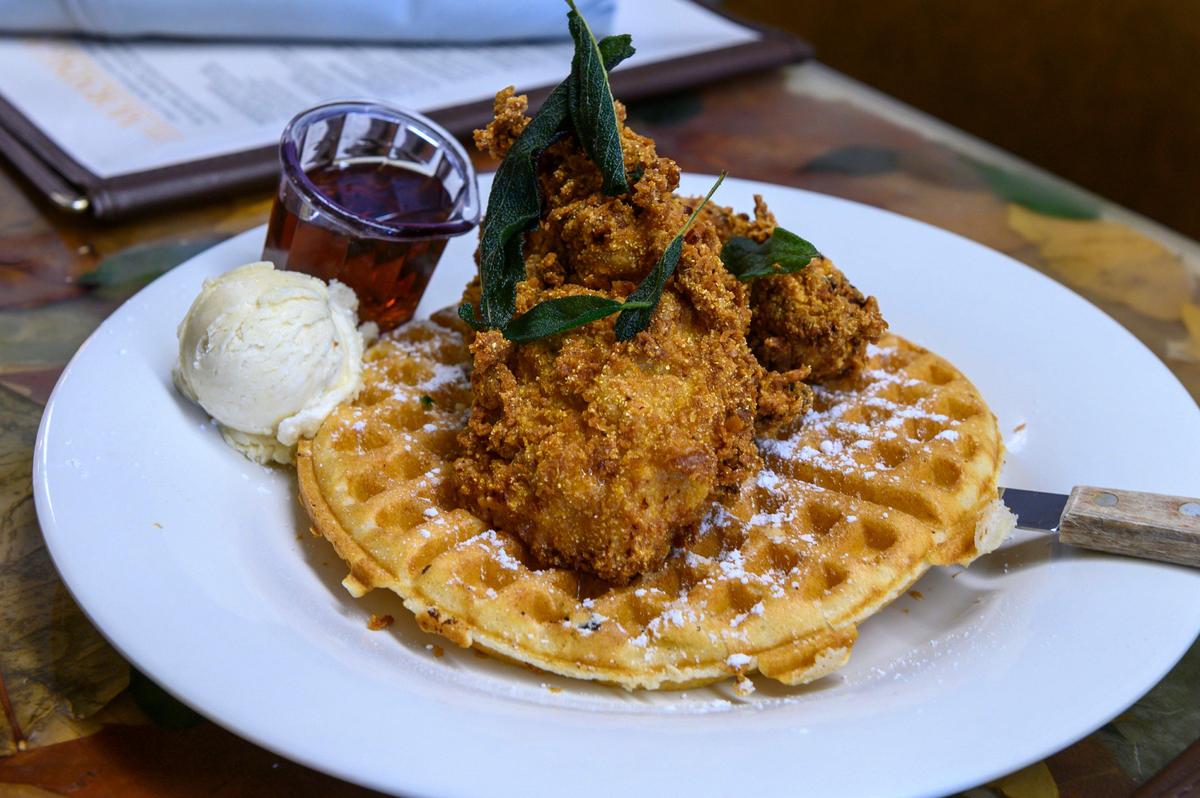 Waffles can be made thin or thick Belgian style and are served with salted maple butter at The Morning Fork. You can add maple sage fried chicken for $6.