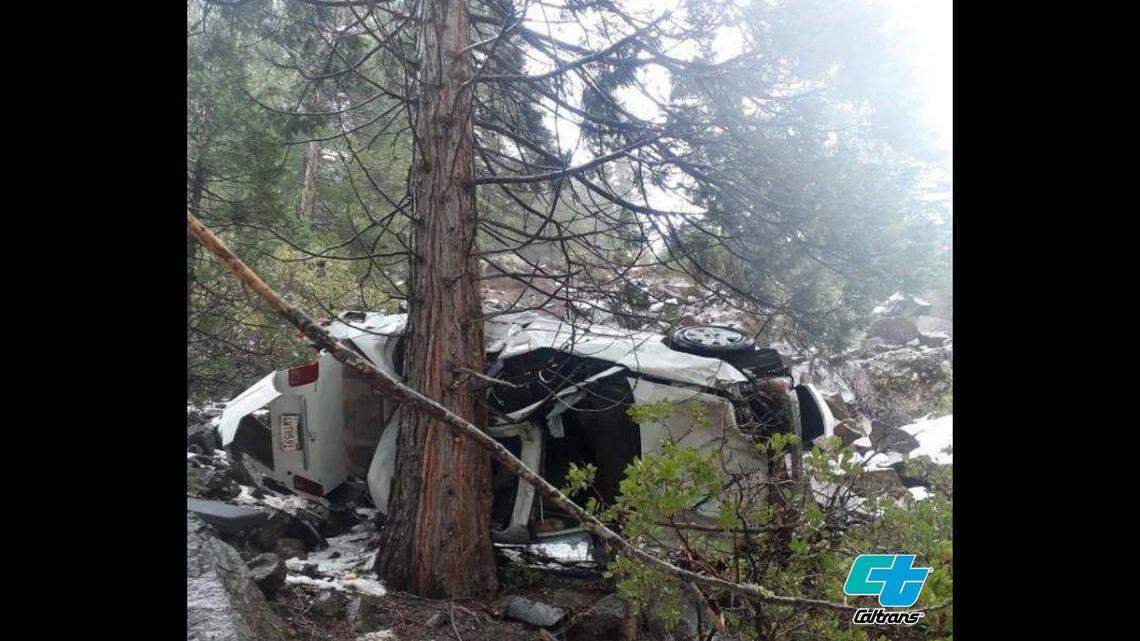 Two highway workers spotted a woman trapped in a vehicle that slid 130 feet down an embankment near Susanville, California, officials say.