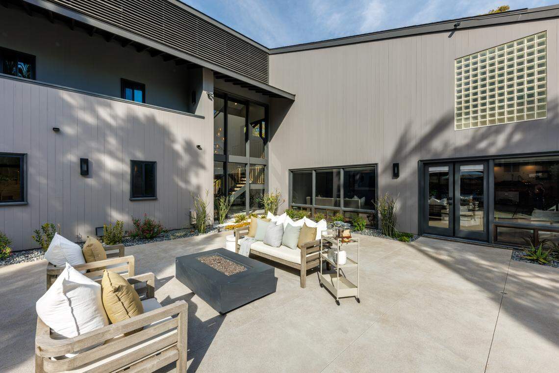 Among the San Diego listing’s other features are an open floor plan, chef’s kitchen and cozy backyard.