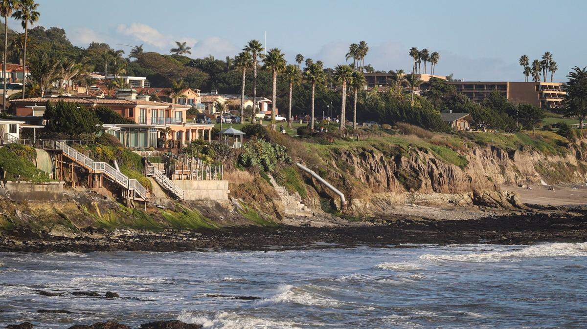Storm driven erosion in Pismo Beach has ocean front home owners concerned. Some houses have sea walls, others do not. The California Coastal Commission has been slow to issue private property permits for sea wall construction.