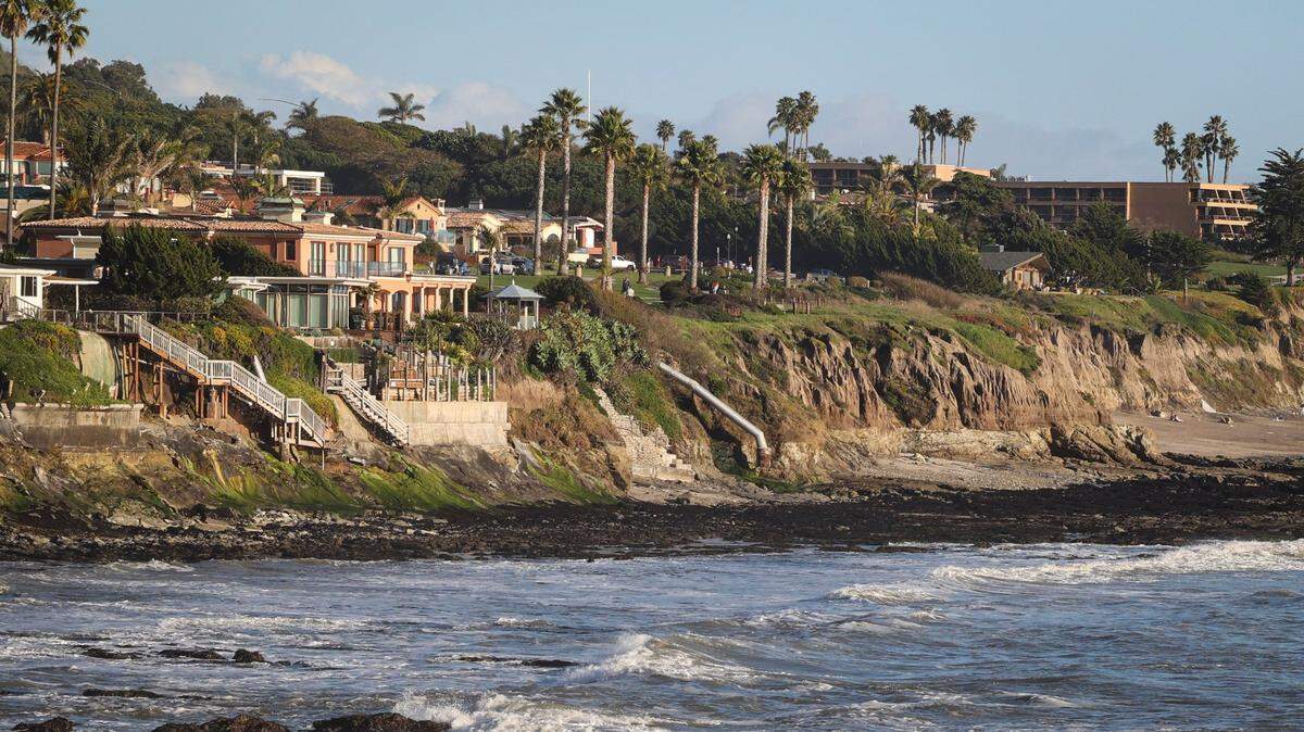 Storm driven erosion in Pismo Beach has ocean front home owners concerned. Some houses have sea walls, others do not. The California Coastal Commission has been slow to issue private property permits for sea wall construction.