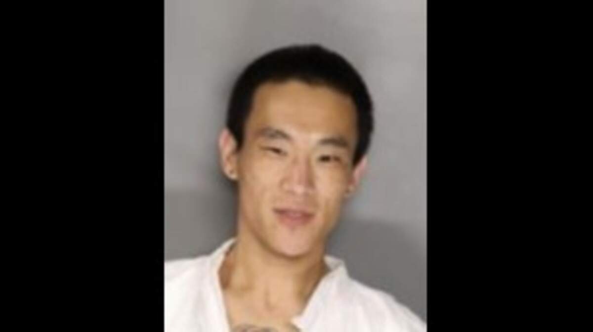 Joseph Yi was arrested Saturday by Sacramento police on suspicion of stabbing a man to death Thursday in Oak Park.