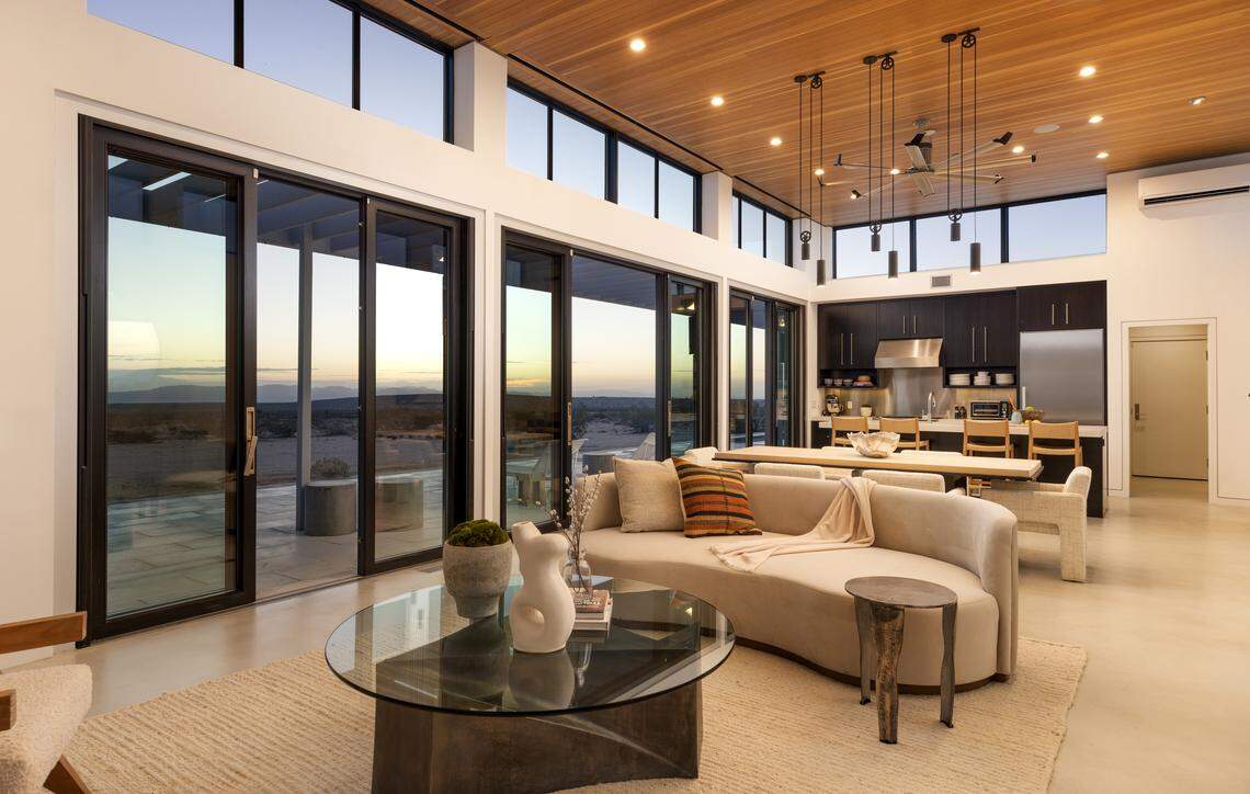 The 4,240-square-foot home on 160 acres features off-grid living with solar, wind power, a recording studio and rooftop deck.