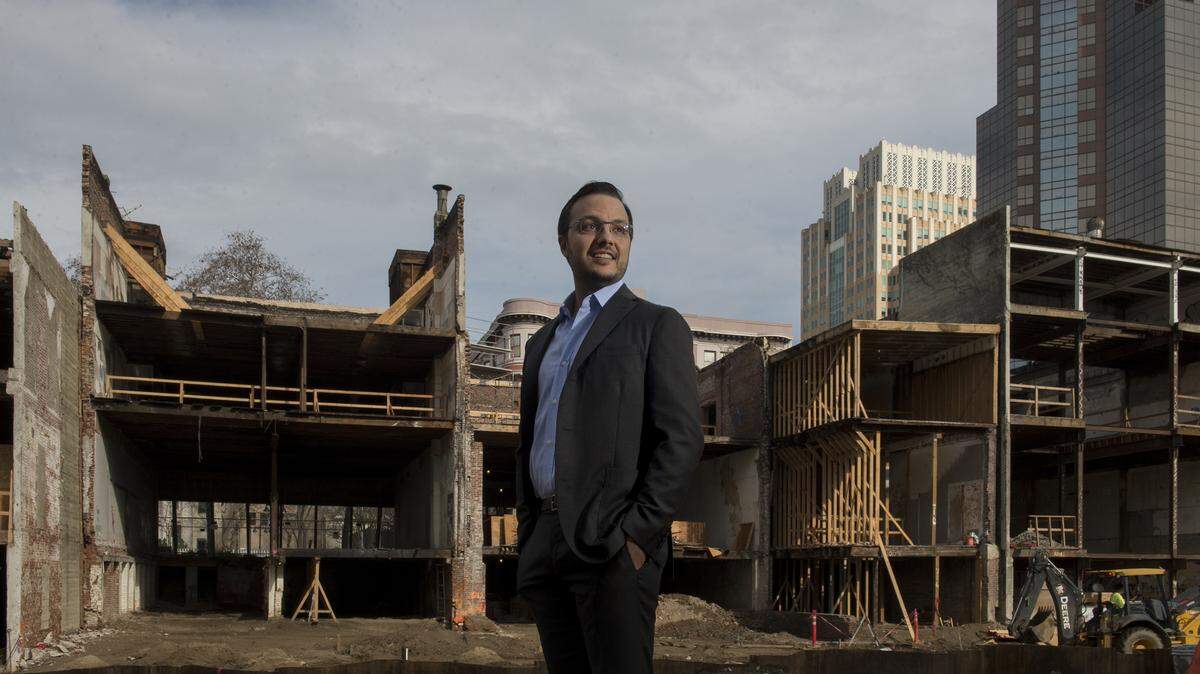 Ali Youssefi visits the 700 block of K Street in January 2016 as construction of the mixed-use project was underway.