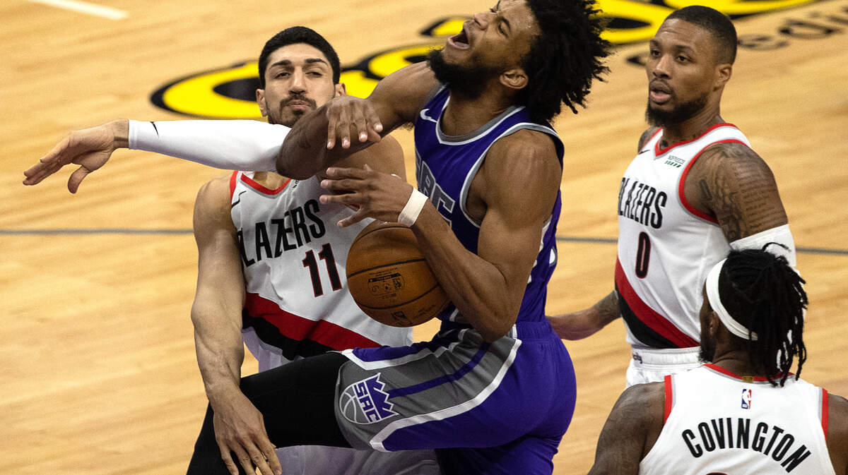 Sacramento Kings forward Marvin Bagley III (35) is founded by IPortland Trail Blazers center Enes Kanter (11) n the third quarter during a game at Golden 1 Center on Wednesday, Jan. 13, 2021 in Sacramento.