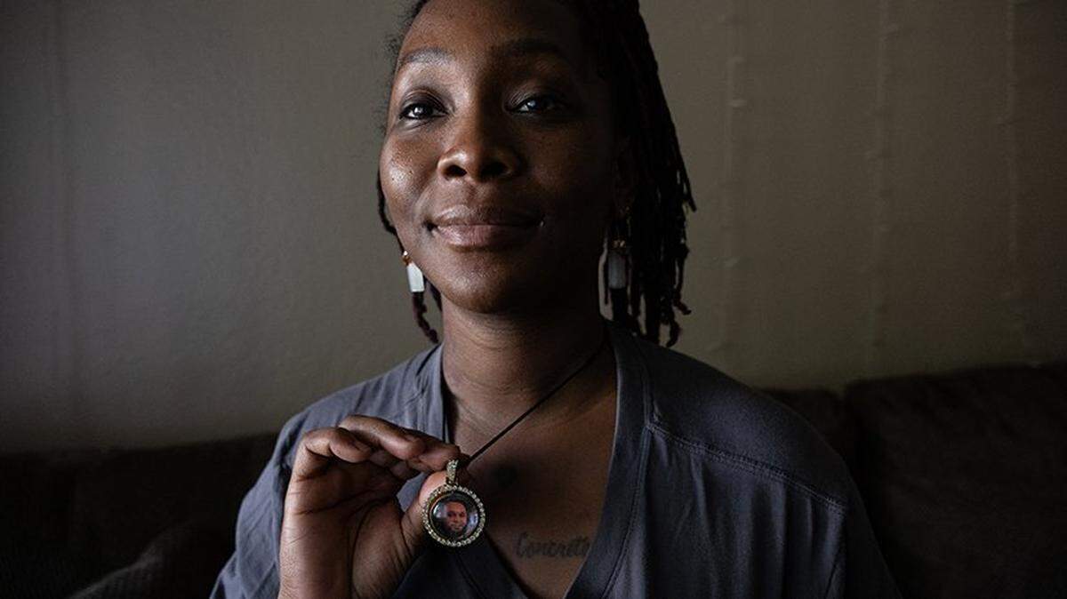 Visalia Dobie-Johnson wears her fiancé Delion Johnson’s T-shirt and a necklace with his picture at her home in Sacramento on Aug. 17 as she talks about his death in the Sacramento County Main Jail in April. His family has sued Sacramento County and its Sheriff’s Office. “He would do anything for his family and for his friends. He never meant any harm to anybody especially intentionally,” said Dobie-Johnson.