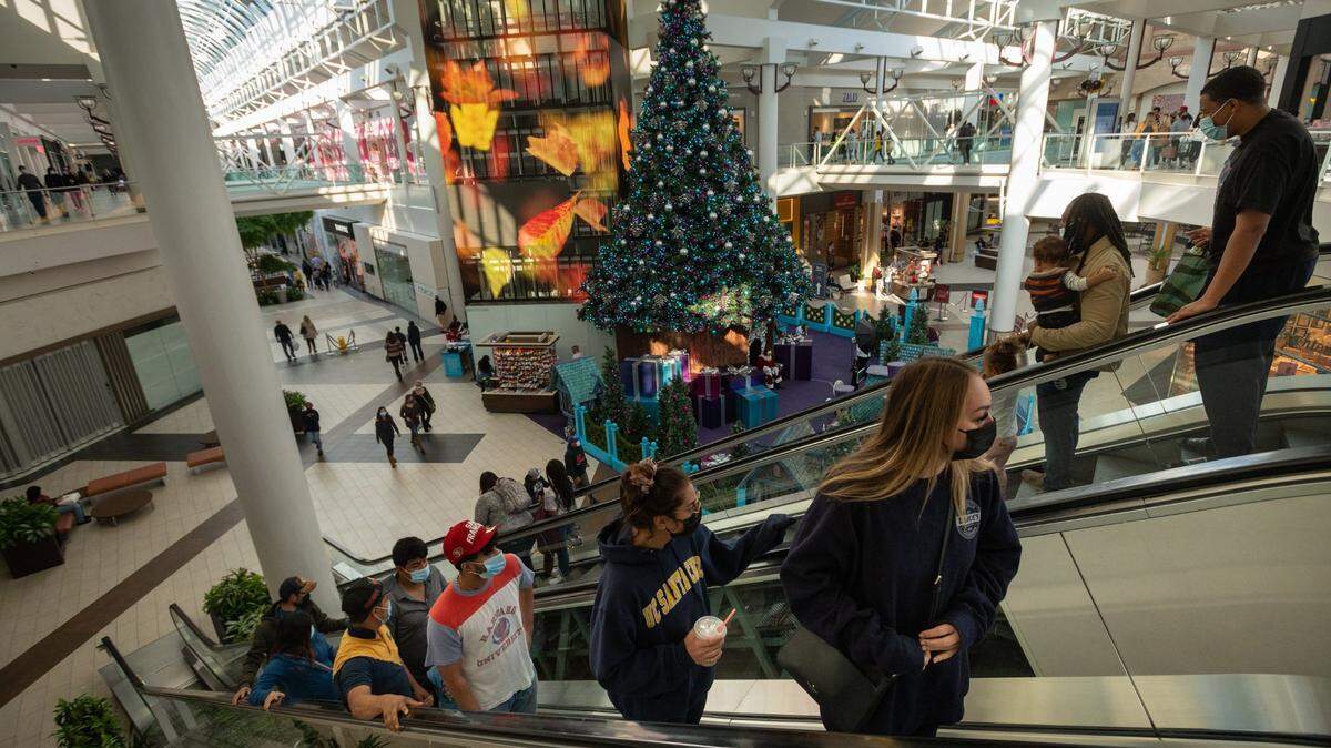 Customers shop on Black Friday at Arden Fair mall on Nov. 26, 2021, in Sacramento.