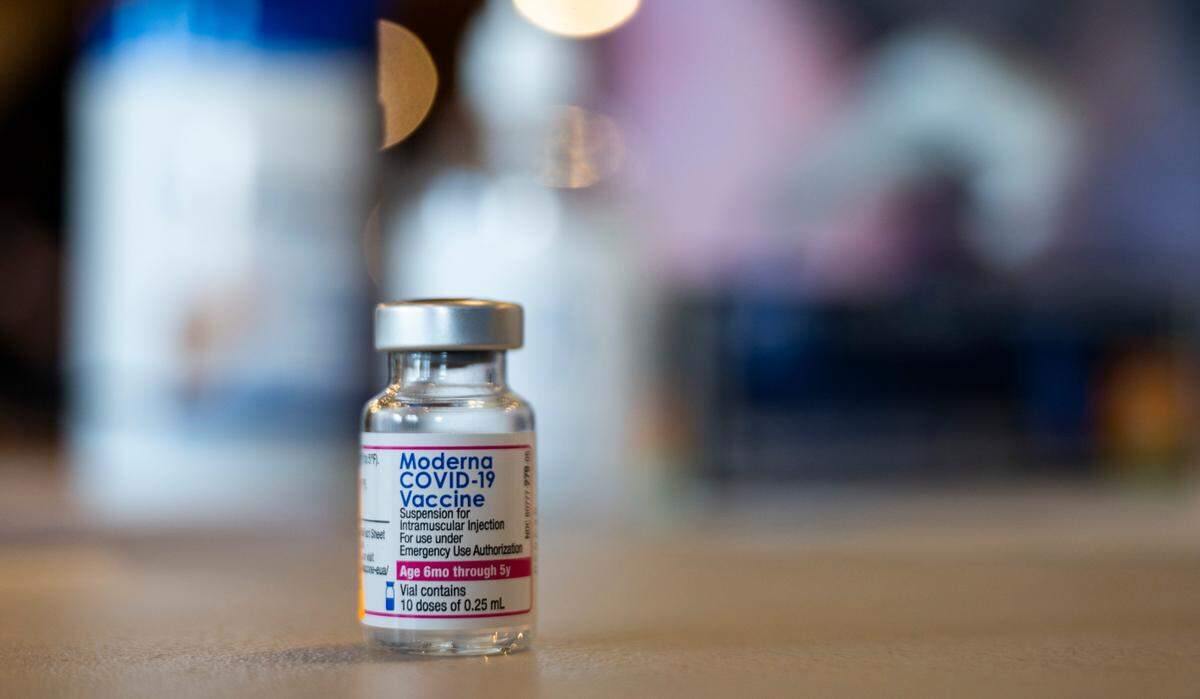 A vial containing 10 doses of Moderna COVID-19 vaccine for children ages 6 months to 5 years awaits the next family at the Kaiser Permanente Bruceville Center Vaccination Clinic in Sacramento on Thursday, June 23, 2022. The clinic was also dispensing the Pfizer version.
