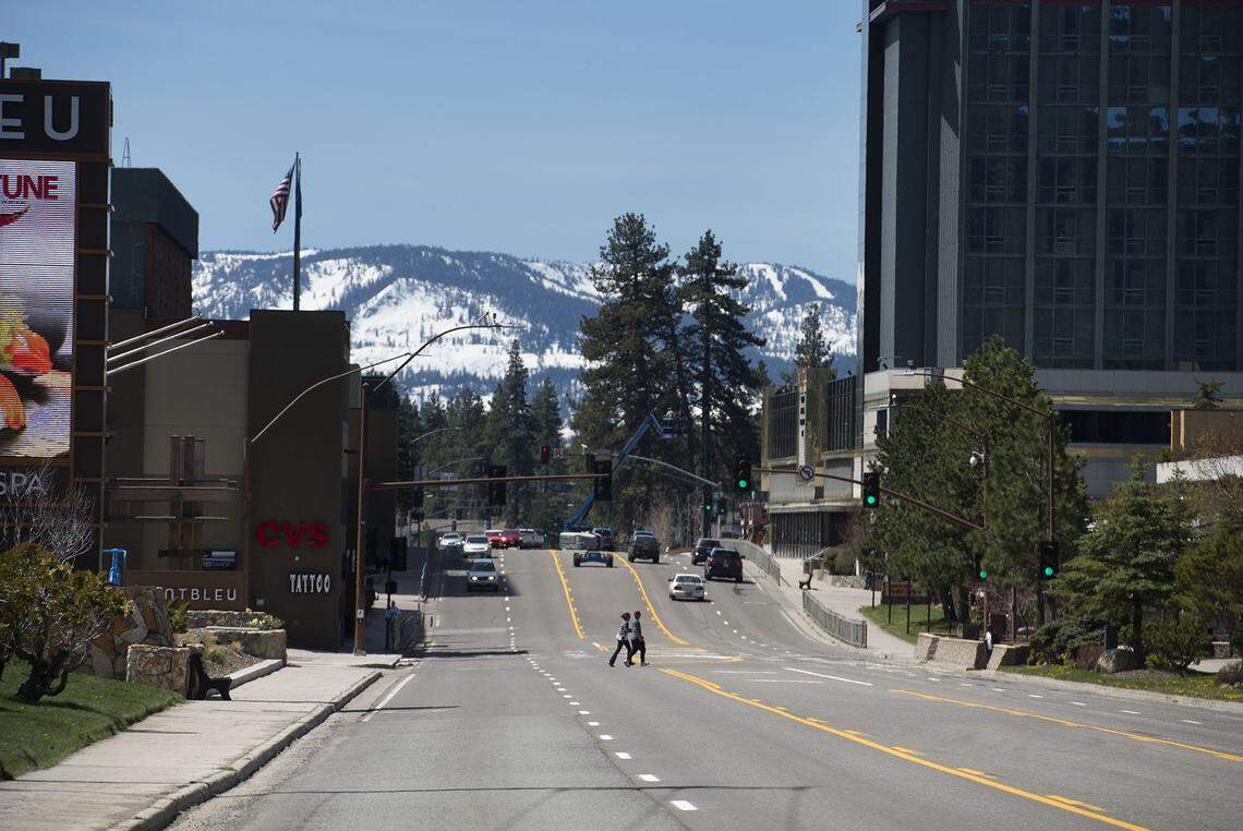Pedestrians cross Highway 50 in South Lake Tahoe on May 2, 2017.