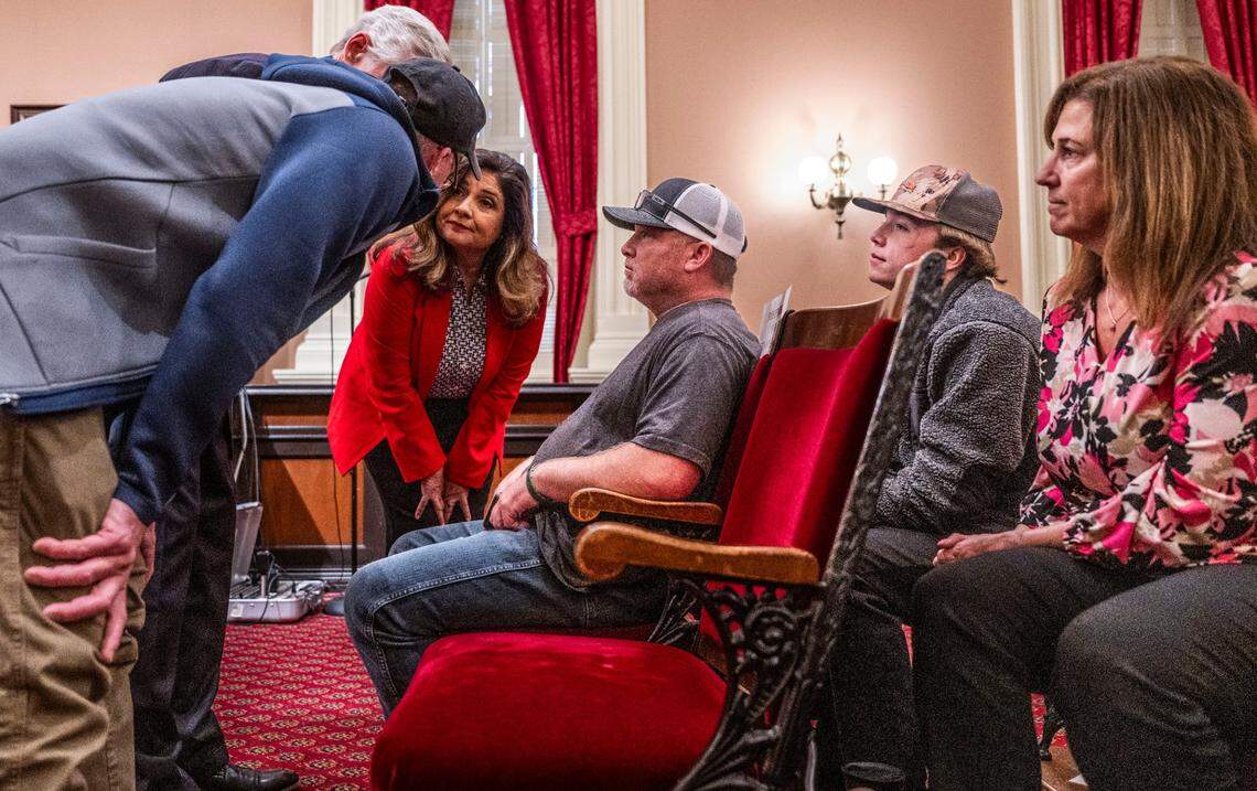 The family of Taylen Brooks, who was killed last year in a mountain lion attack, listens to state Sen. Marie Alvarado-Gil, R-Jackson, as she asks for their input on proposed amendments during a Tuesday committee hearing on Senate Bill 818. Alvarado-Gil rejected the proposed changes to the bill, which would have allowed trained dogs and their handlers to chase away mountain lions.