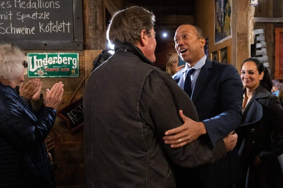 Third Congressional District candidate Dr. Kermit Jones greets Rep. John Garamendi, D-Walnut Grove, with other supporters at Kathrin’s Biergarten in Rocklin on Tuesday, Nov. 8, 2022.