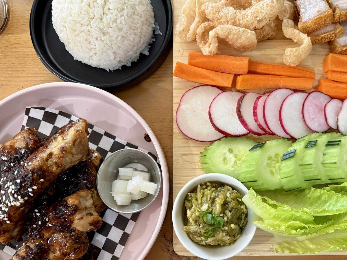 Sticky-sweet Lion City Coffee Ribs and a snacking board called Dipper's Delight are featured at Sapha Kafae, a cafe modeled after ones in Southeast Asia.