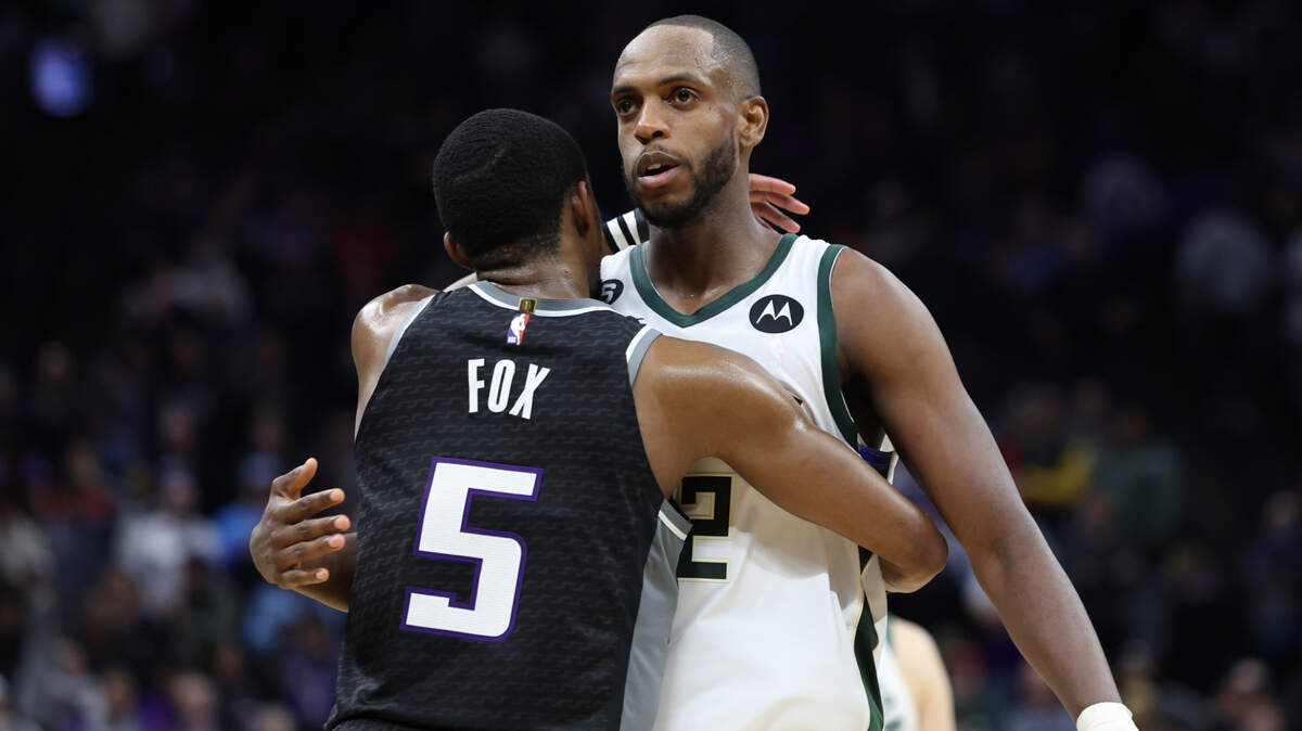 Sacramento Kings point guard De’Aaron Fox (5) and Milwaukee Bucks small forward Khris Middleton (22) meet during the fourth quarter March 13, 2023, at Golden 1 Center.
