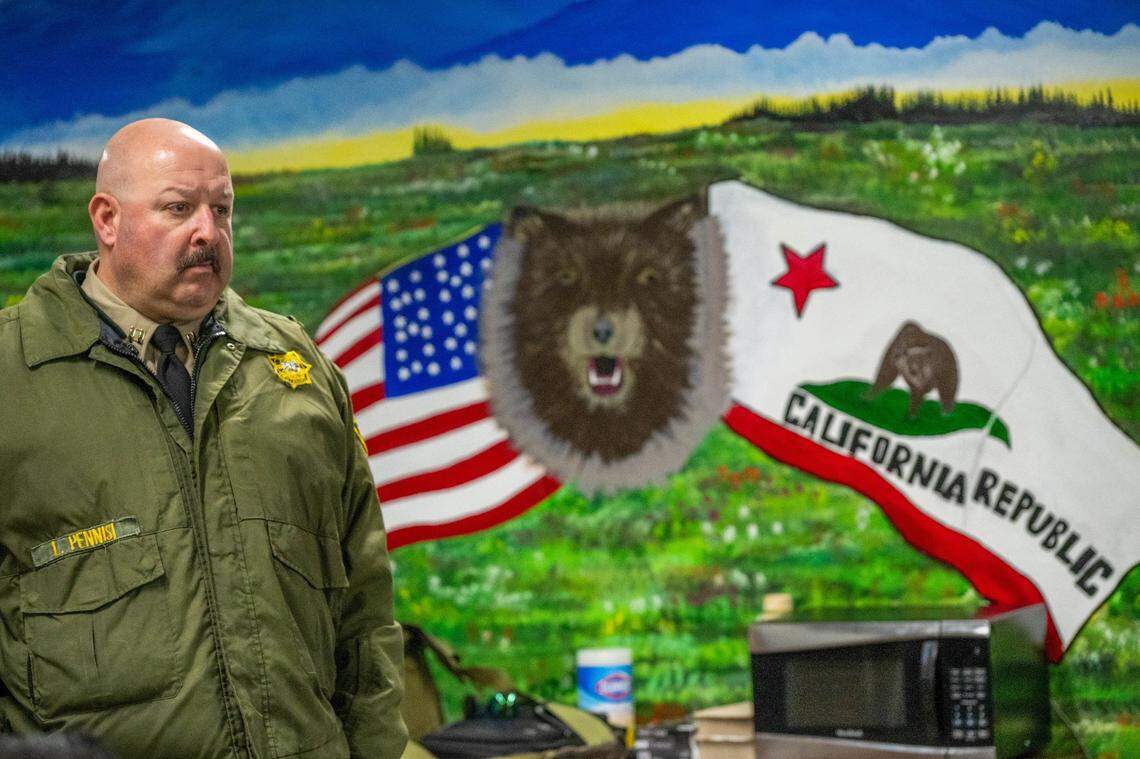 Capt. Lenard Pennisi of the Salinas Valley Resource Team, stands in front of a mural in the rehabilitation room on March 6, 2025. “Every institution has developed their own way of running the California Model. Here at this institution is where it started – we are basically at ground zero,” he said. “The violence has gone down dramatically.”