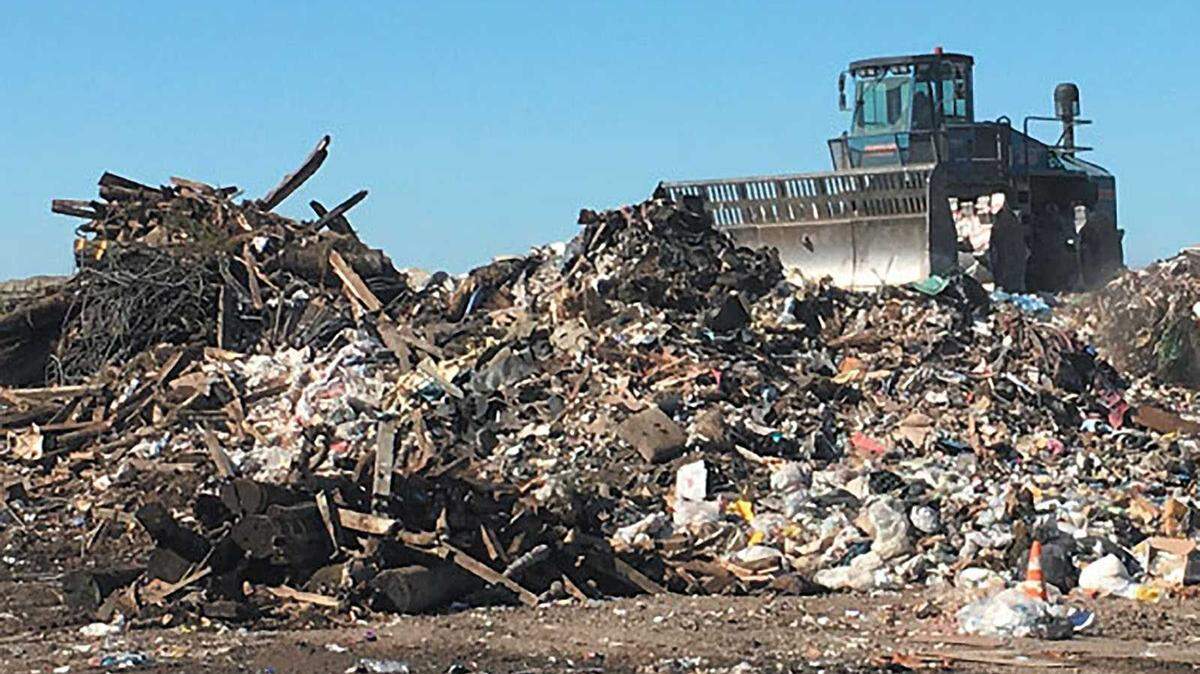 A bulldozer is seen at the Neal Road Recycling and Waste Facility in Butte County in an undated photo. A Chico woman who was the victim of a hit-and-run driver after police abandoned her at the county facility has settled her lawsuit with the city of Oroville for $3 million.