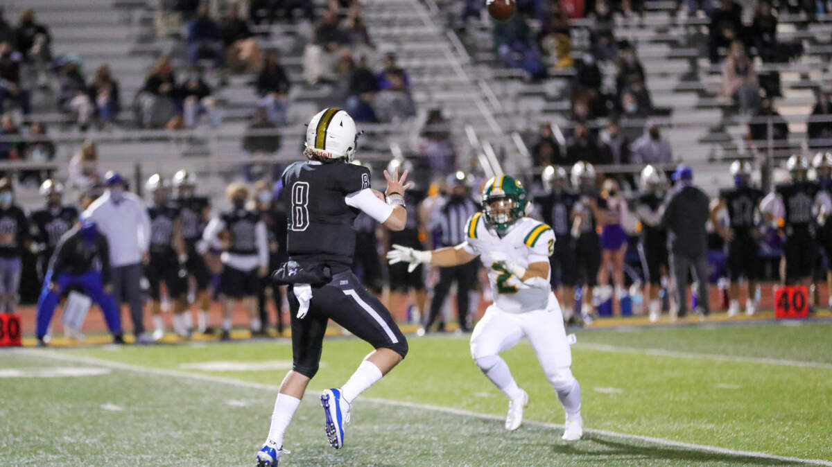Lincoln quarterback J.T. Willis threw for 242 yards and five touchdowns in a 54-41 win over Placer on Friday.