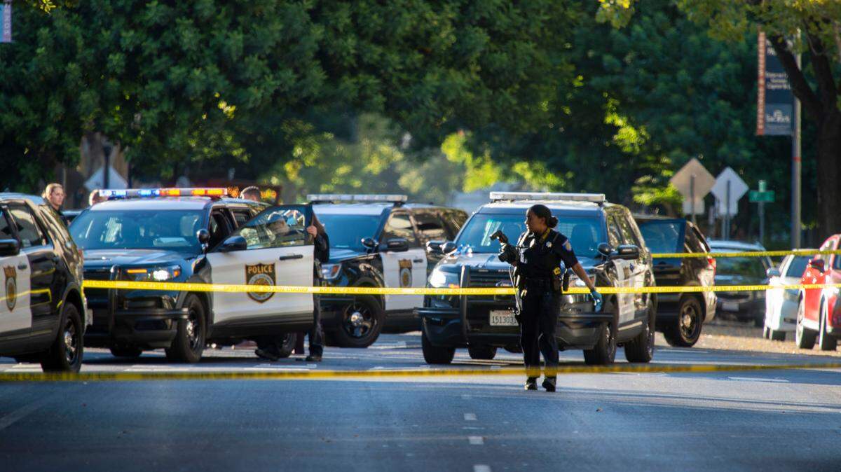 Sacramento police investigate the scene of a shooting outside the Mix nightclub at 16th and L streets in downtown Sacramento on Monday, July 4, 2022. It was the second mass shooting at a downtown entertainment area in three months.