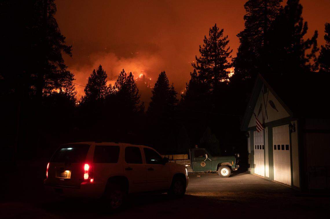The Caldor Fire burns across Highway 50 east of Echo Summit toward Christmas Valley on Aug. 30 in El Dorado County.